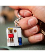Handgefertigter Schlüsselanhänger aus Lindenholz im Design der Multiholk De Stijl. Ein originelles Geschenk für Vogel-, Natur- und Skandinavienliebhaber. Hoezo-Kado