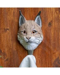 Kleiderhaken Luchs von Wildlife Garden aus handgeschnitztem Holz. Mit Glasaugen, schwarzen Ohrpinseln und bronzefarbenem Metallhaken.